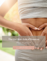 Person holding a guide titled 'The Gut Skin-Axis of Rosacea' with a blurred outdoor background.